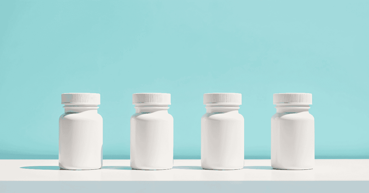 Five white packaging bottles in a row with blue background and shadows representing packaging material types