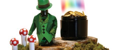 Green-colored packaging containers arranged for Saint Patricks Day product display