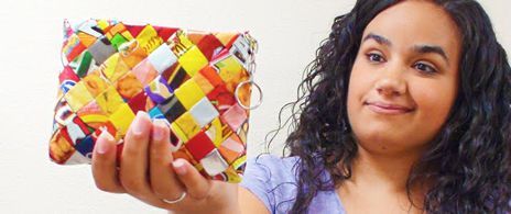 Colorful bag woven from recycled plastic bottle wrappers